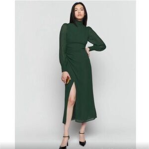 mila trim short jersey dress RUN THE COURT JERSEY MINI DRESS WITH FEATHER TRIM IN GREEN – AKIRA main image 0